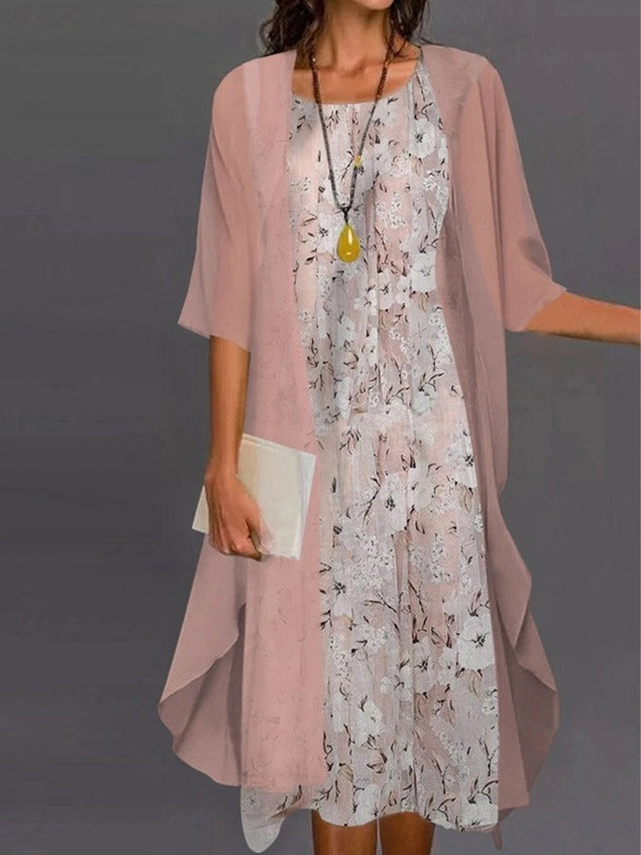 Woman wearing pink floral two-piece set with relaxed crew neck and coordinating layers