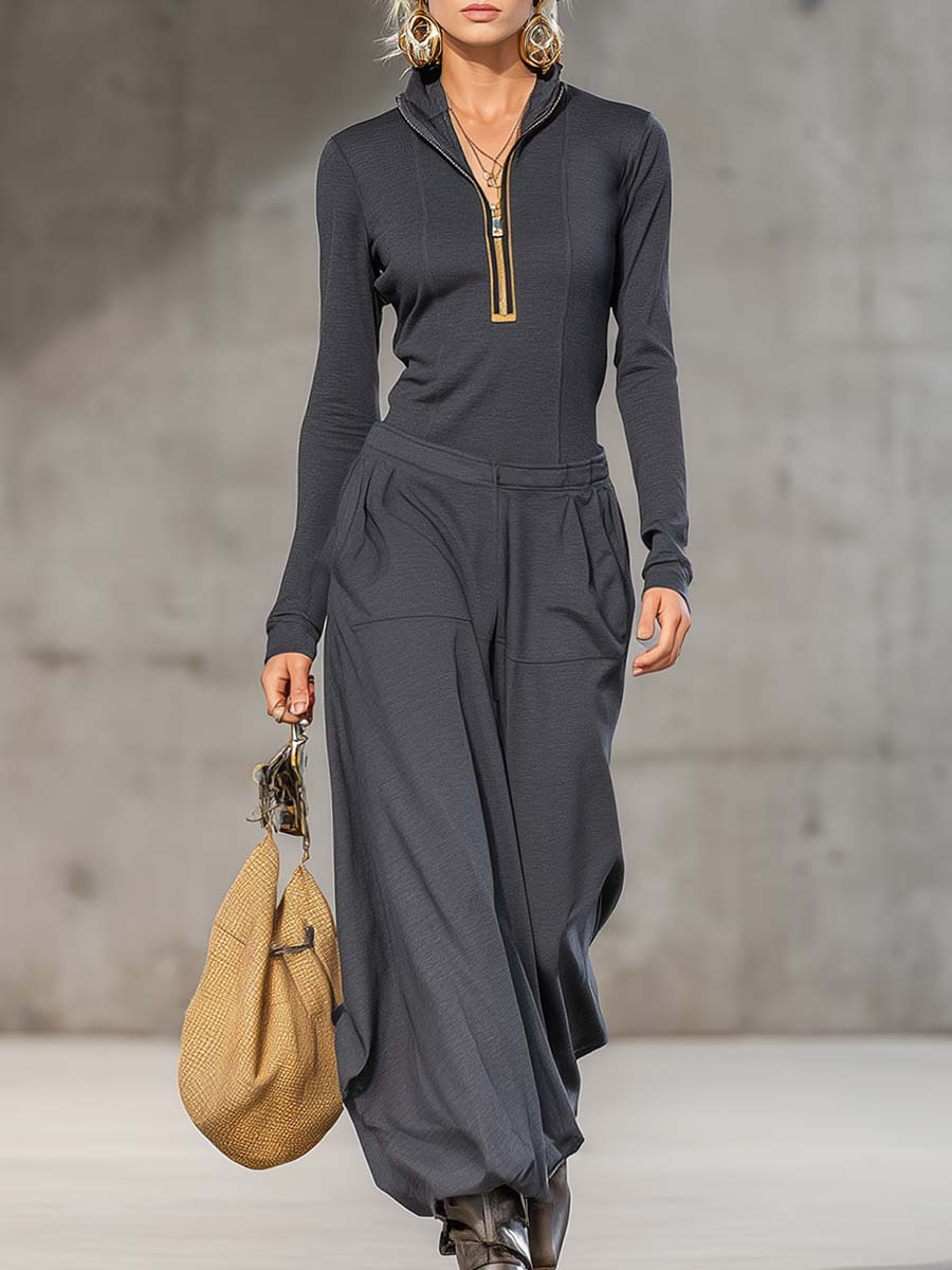 Model wearing women's dark gray casual zipper top and wide pants set