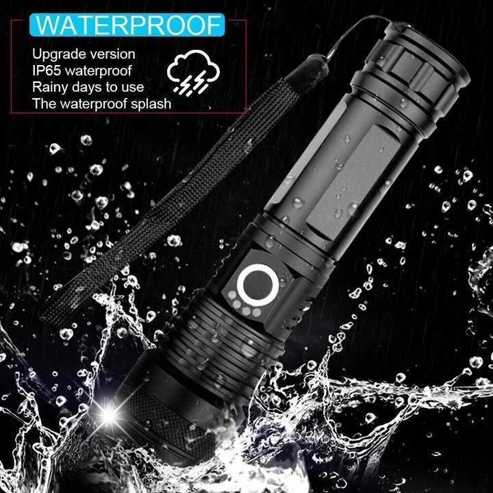 High-lumen tactical LED flashlight glowing brightly in a dark outdoor setting