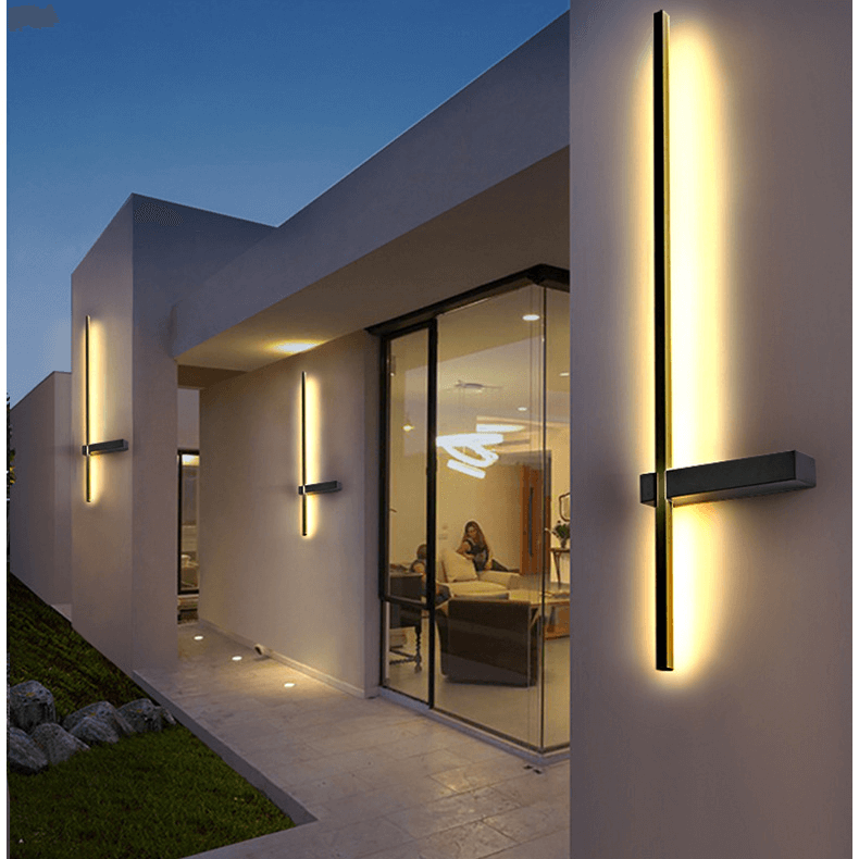 Modern black wall lamp for outdoor use shown against a neutral concrete background