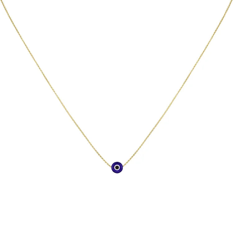 Close up of glossy evil eye charm pendant on delicate chain