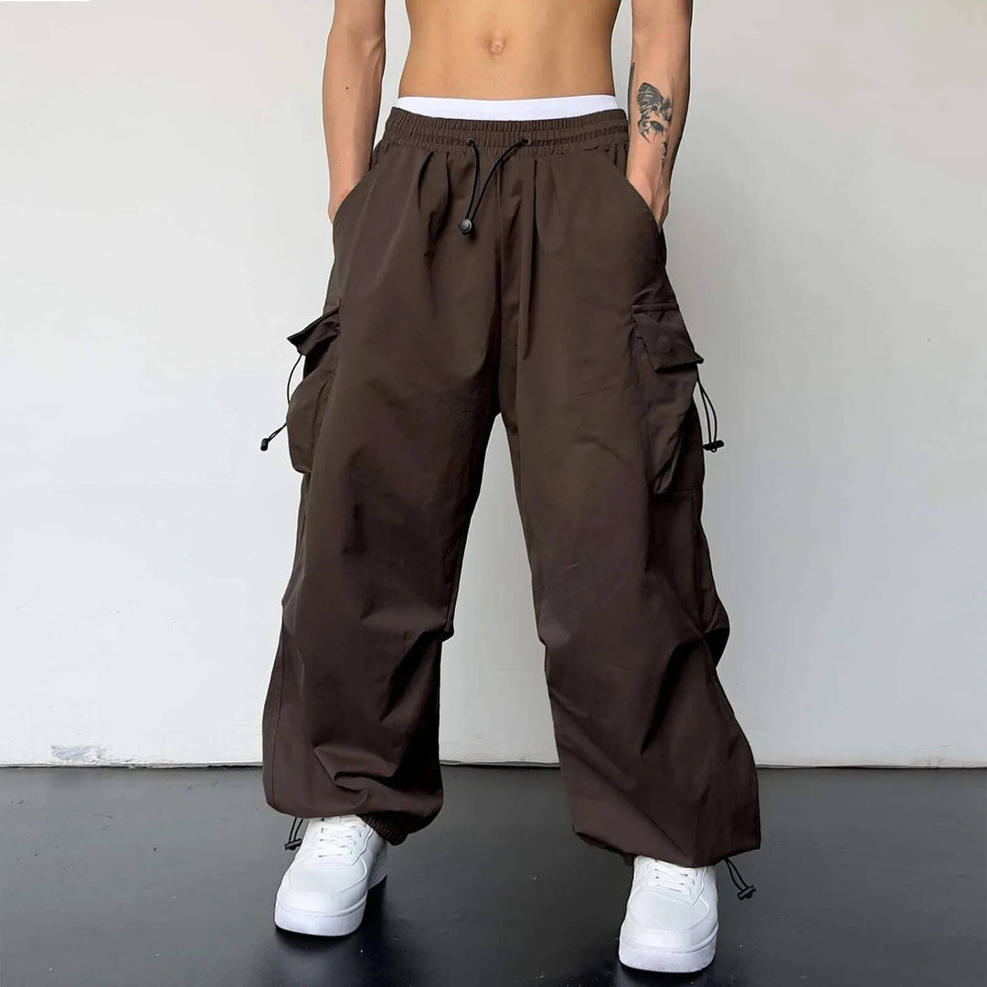 Relaxed fit trousers styled in a modern minimalist urban outfit setup