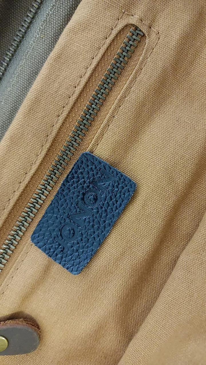 Model wearing unisex canvas messenger bag crossbody for daily commute and travel