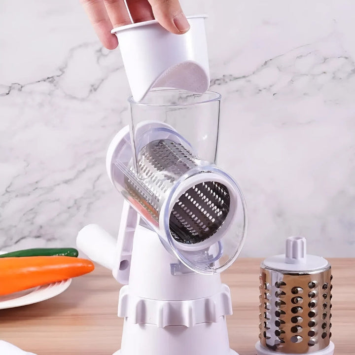Manual vegetable slicer and food shredder preparing fresh salad ingredients