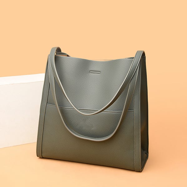Green Mikaella luxury tote bag showcasing its structured silhouette
