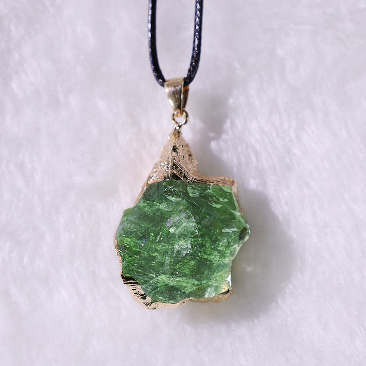Green crystal meteorite jewelry piece worn, highlighting its raw gemstone beauty