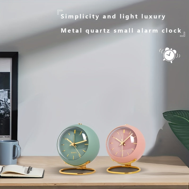 Silent table clock showing luminous hands in dim lighting