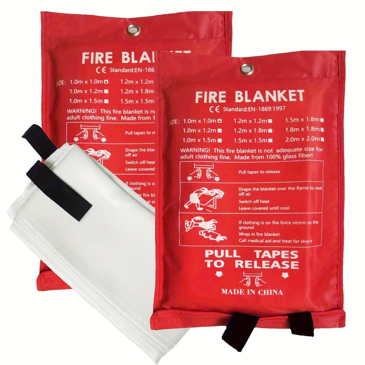 Two red emergency fire blanket storage pouches with white fire blankets displayed