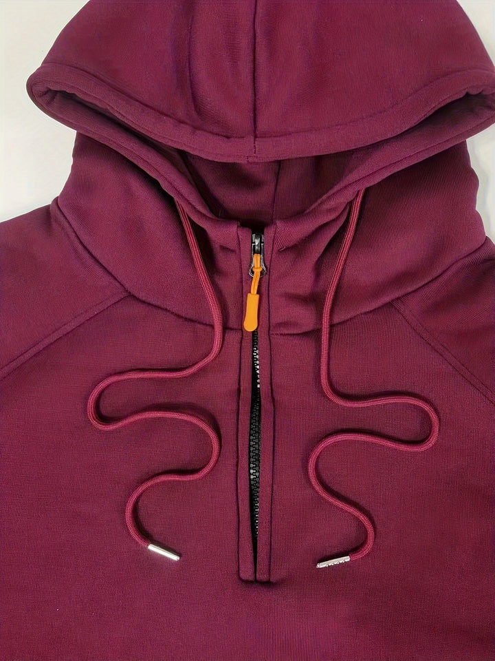 Detail of hood lining and drawstrings on men's casual pullover hoodie.