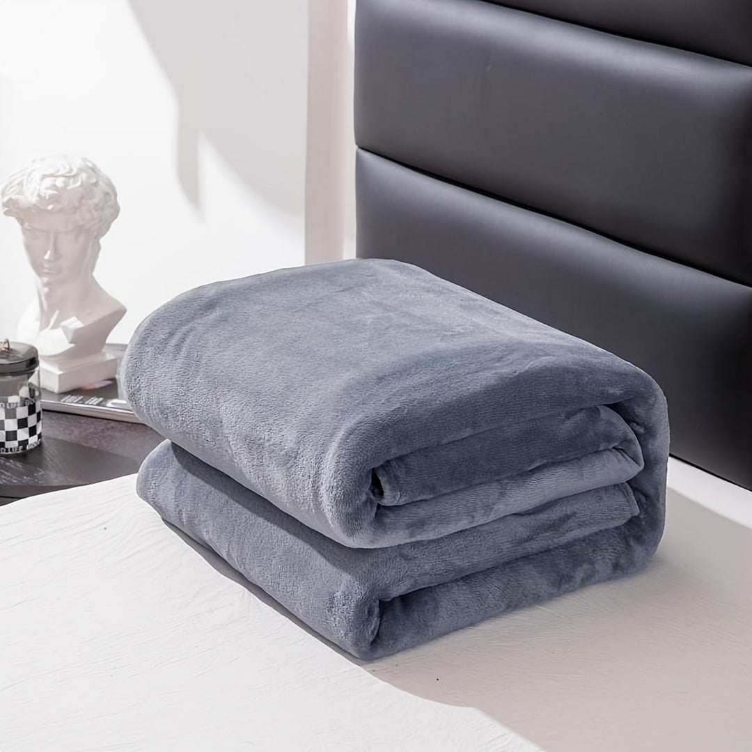 Soft fleece throw blanket displayed to show its lightweight yet warm feel