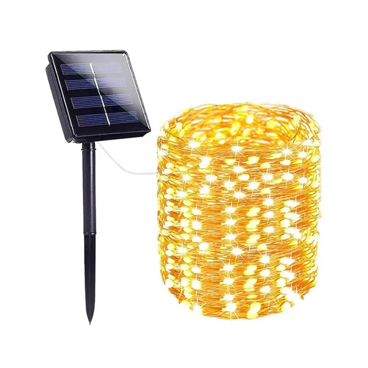 Solar-powered outdoor lighting illuminating shrubs and pathways at dusk
