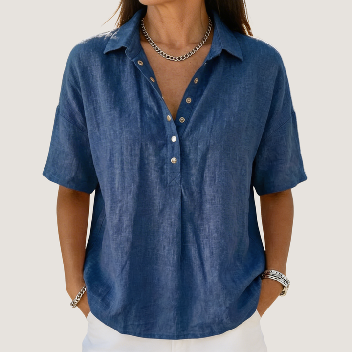 Stylized flat lay of short sleeve collared shirt with accessories