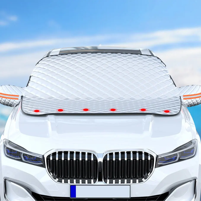 White car front view with magnetic windscreen snow cover installed