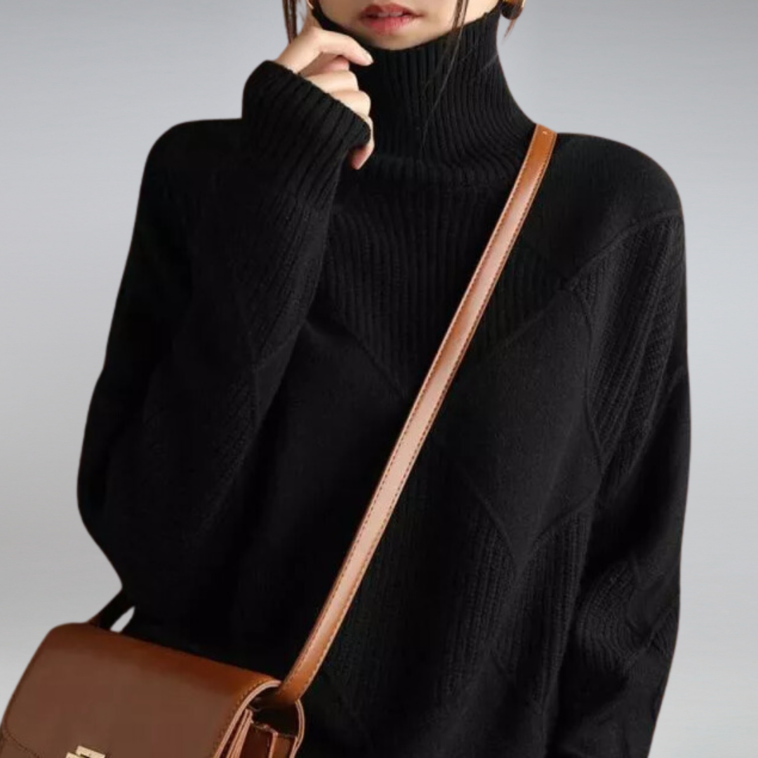 Detail view of premium ribbed cuffs on long sleeves of a casual knit top.