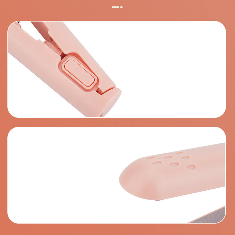 Travel-friendly mini hair styling tool plugged in and ready for hair curling