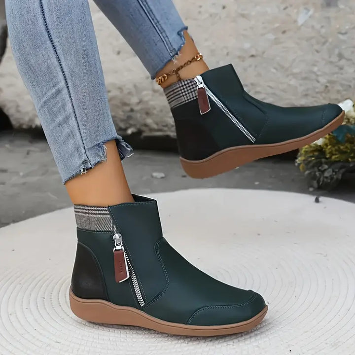 Arch support shoes ankle boots displayed on wooden surface showing waterproof texture
