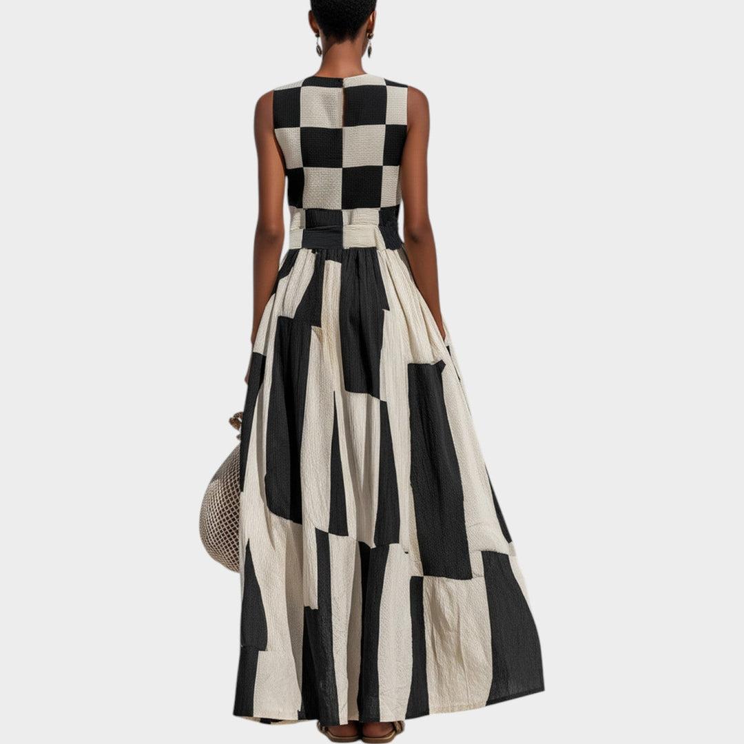 Back view of woman showcasing the chic checkerboard patterned maxi dress