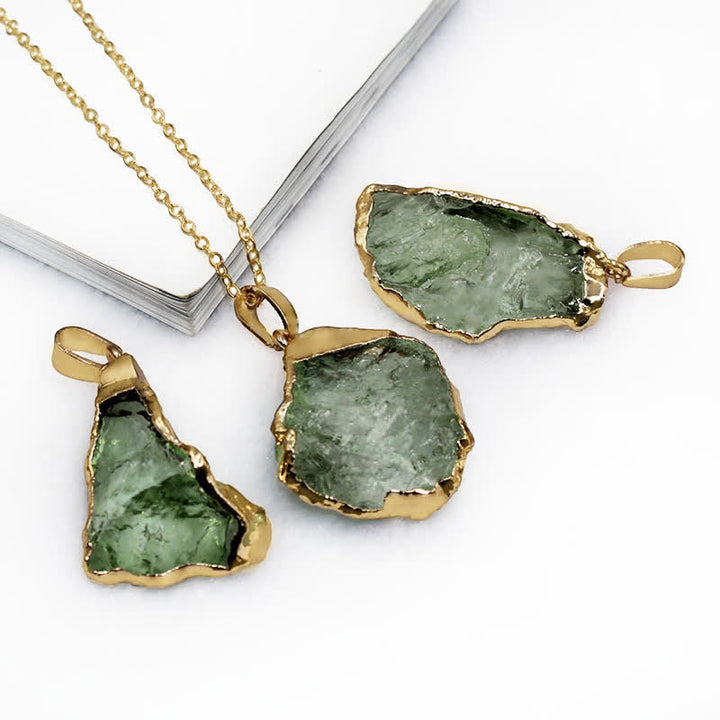 Detailed view of the natural stone pendant on the raw Moldavite necklace