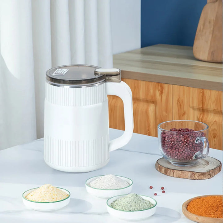 Compact electric spice grinder and coffee grinder kitchen appliance