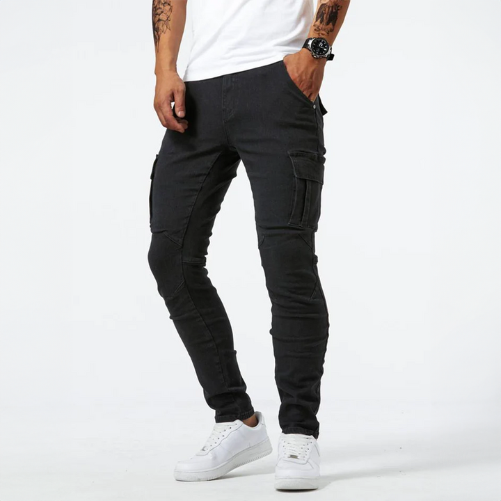 Detailed shot of button closure and zipper fly on mens slim fit cargo jeans