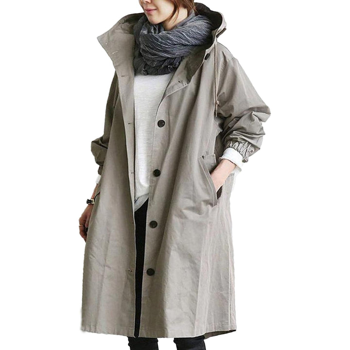 Women's long waterproof raincoat with hood in full body view