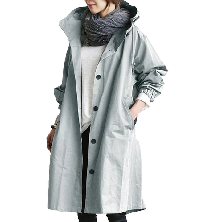Side view of hooded windbreaker coat for women showing length