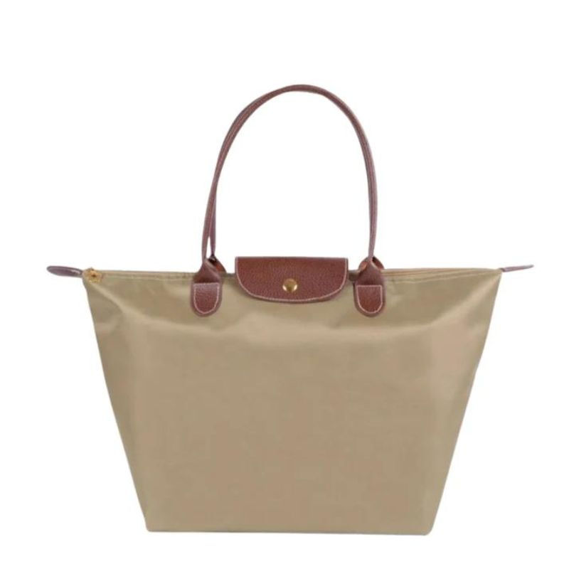 Travel friendly tote bag style womens shoulder handbag flat lay view