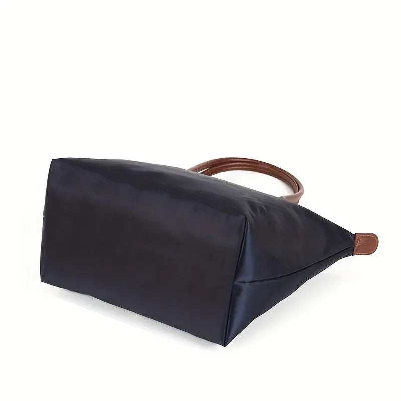 Bottom angle view of women's dark blue shoulder handbag