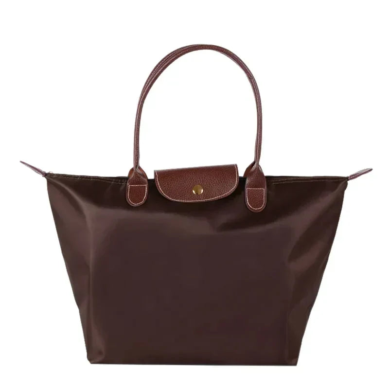 Close up of durable strap and hardware on the casual womens daily shoulder handbag