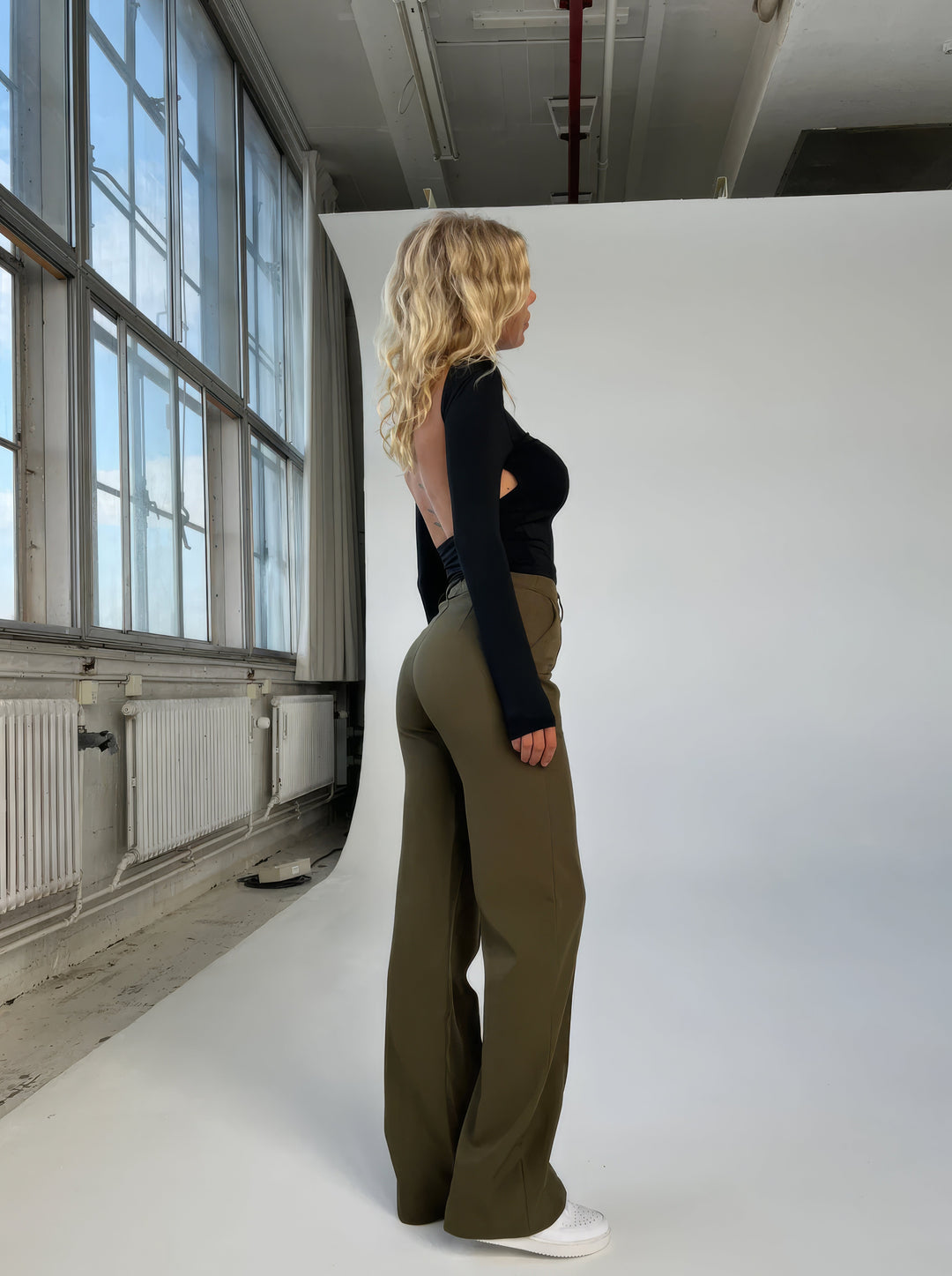 Casual wear chic trousers showcasing smooth draping and tailored style