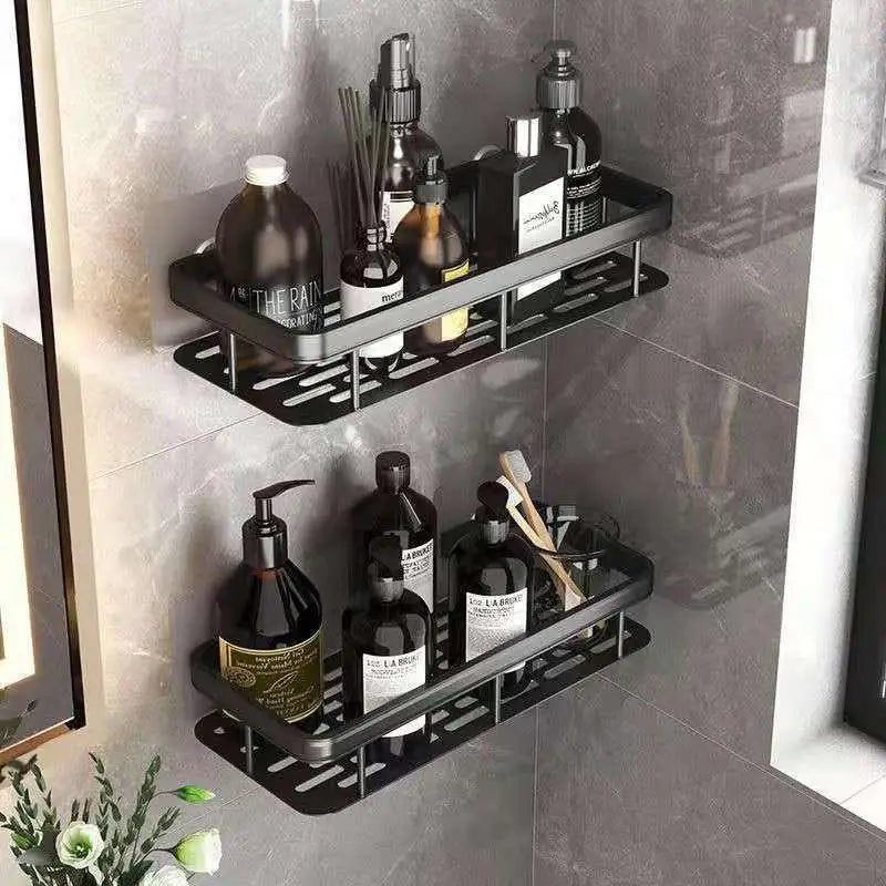 Black bathroom shelf holding skincare bottles and accessories