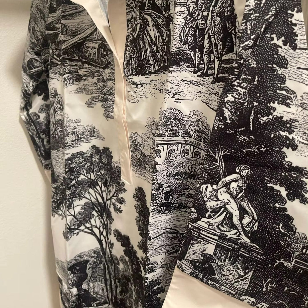Close up of the vintage toile pattern on a womens tunic dress