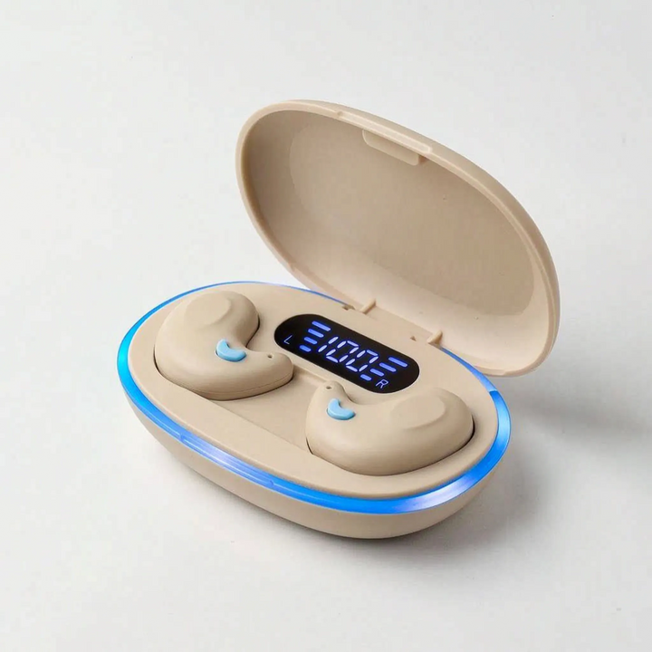 Travel accessories set highlighting compact wireless bluetooth earbuds