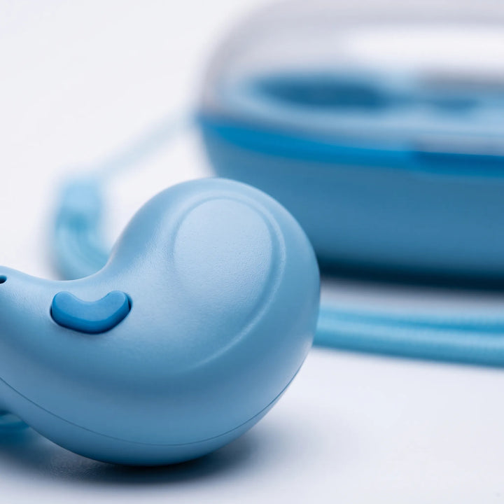 Bluetooth earbuds resting securely inside a sleek portable charging dock