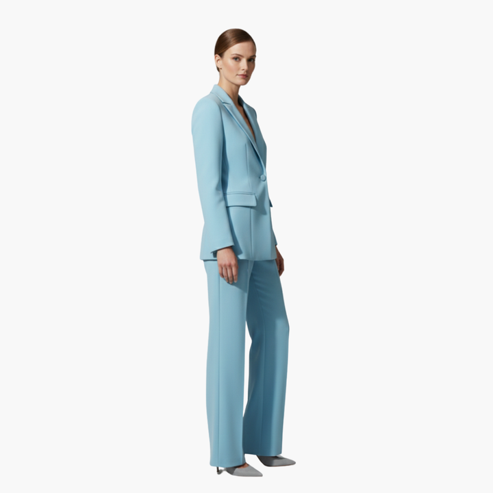 Side profile of a model wearing a light blue tailored suit