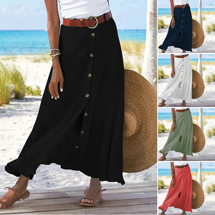 Flat lay of women's summer skirt highlighting soft fabric and button detail