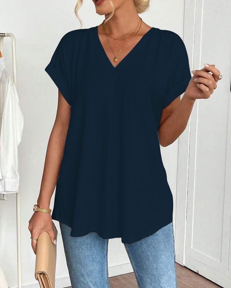 Woman wearing navy blue V-neck t-shirt