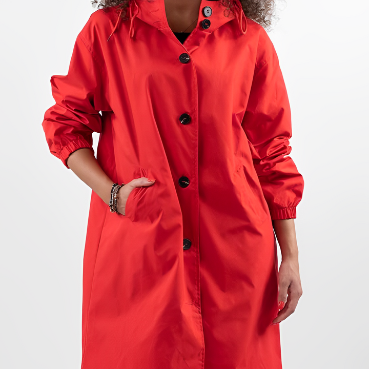 Model wearing casual womens lightweight rain jacket during outdoor hike
