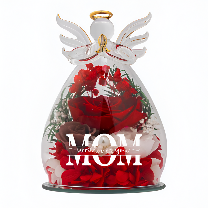 Glass angel keepsake holding a preserved floral arrangement for mothers day