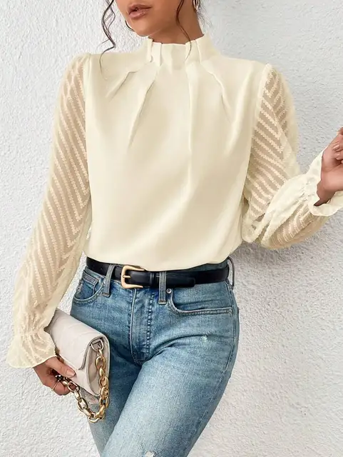 Close-up view of White Elegant Half Turtleneck Ruffled Long Sleeve Blouse styled with denim
