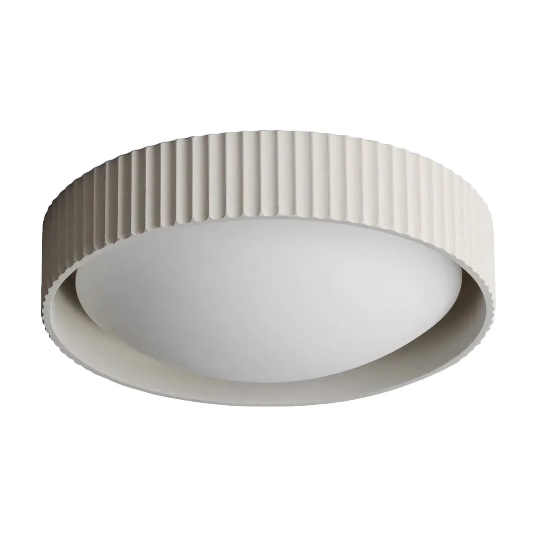 Complete room view highlighting the modern concrete ceiling lighting