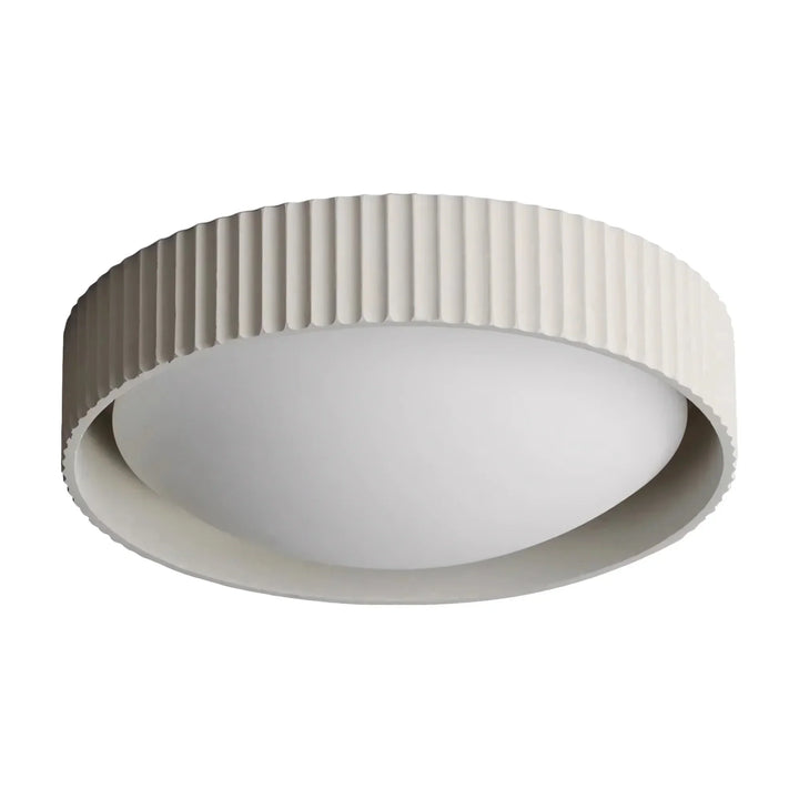 Complete room view highlighting the modern concrete ceiling lighting