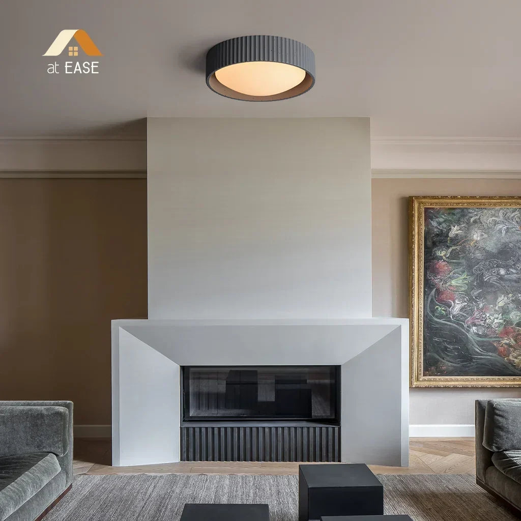 Illuminated concrete ceiling fixture casting a soft downward glow
