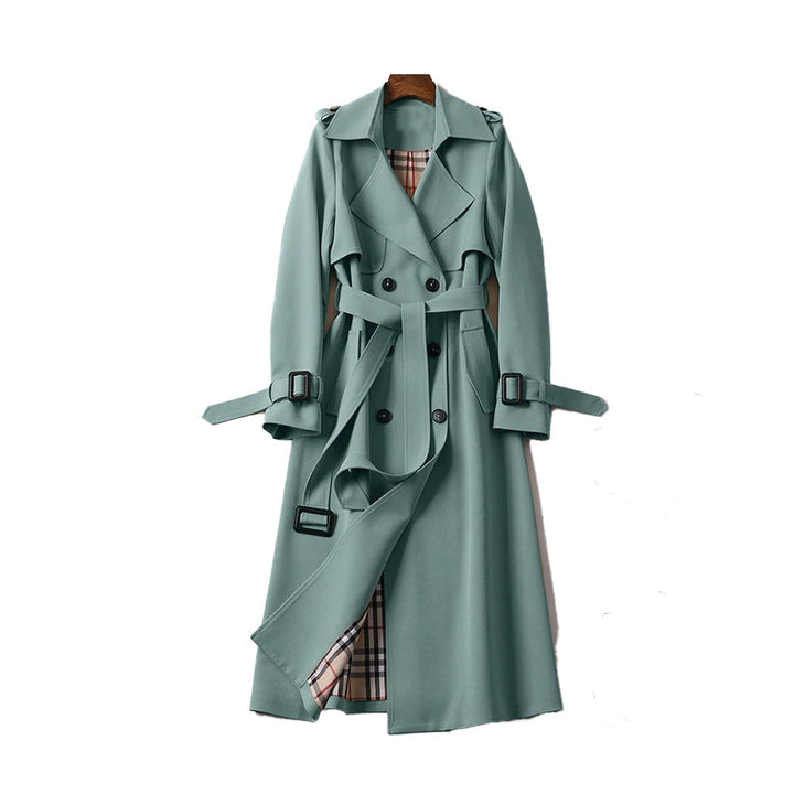 Close-up of adjustable sleeve buckle and cuff on chic fall outerwear