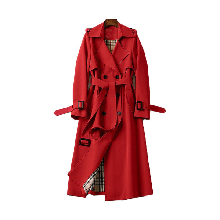 Detailed view of fabric tie belt and deep pockets on classic coat