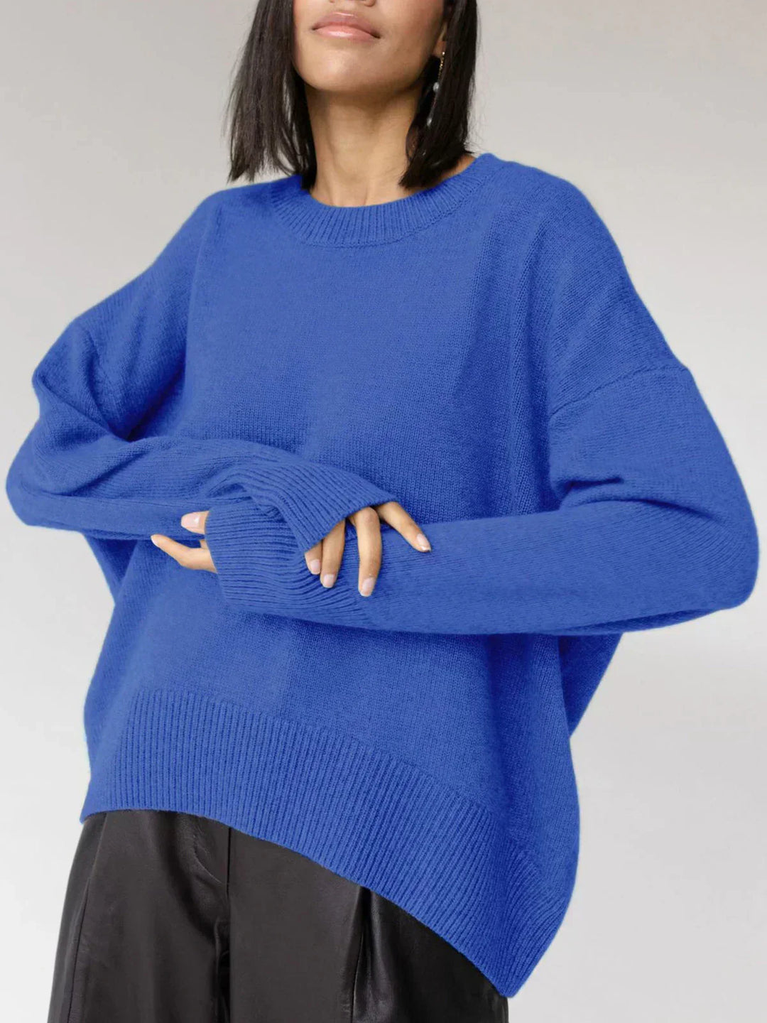 Model showcasing blue casual knit sweater with crewneck