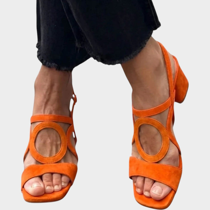 Close up of open toe summer party shoes with ankle strap