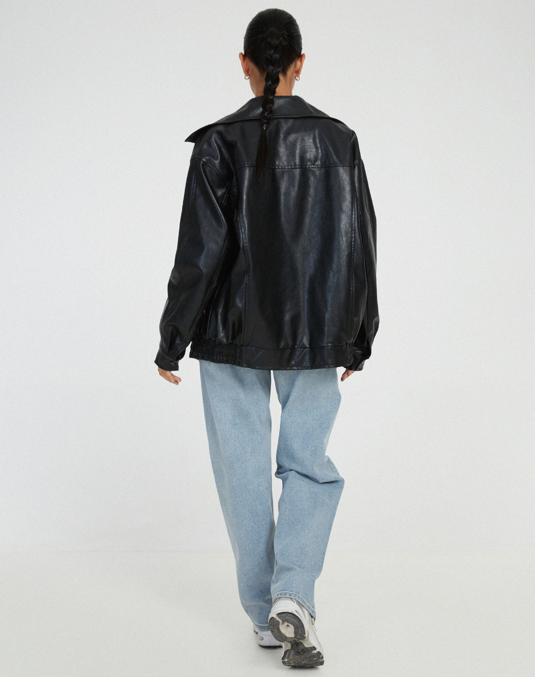 Stylish women's outerwear streetwear look featuring an oversized biker jacket