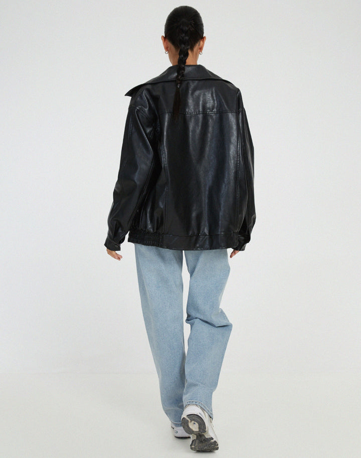 Stylish women's outerwear streetwear look featuring an oversized biker jacket