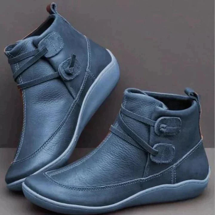 Pair of blue women's comfort ankle boots displayed on a neutral surface